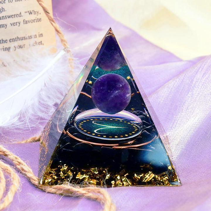 Pirámide de orgón del zodiaco Aries con esfera de amatista y obsidiana de Olivenorma 