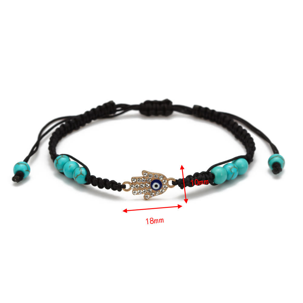 Pulsera trenzada ajustable con ojo malvado y circonita blanca y turquesa de Olivenorma 