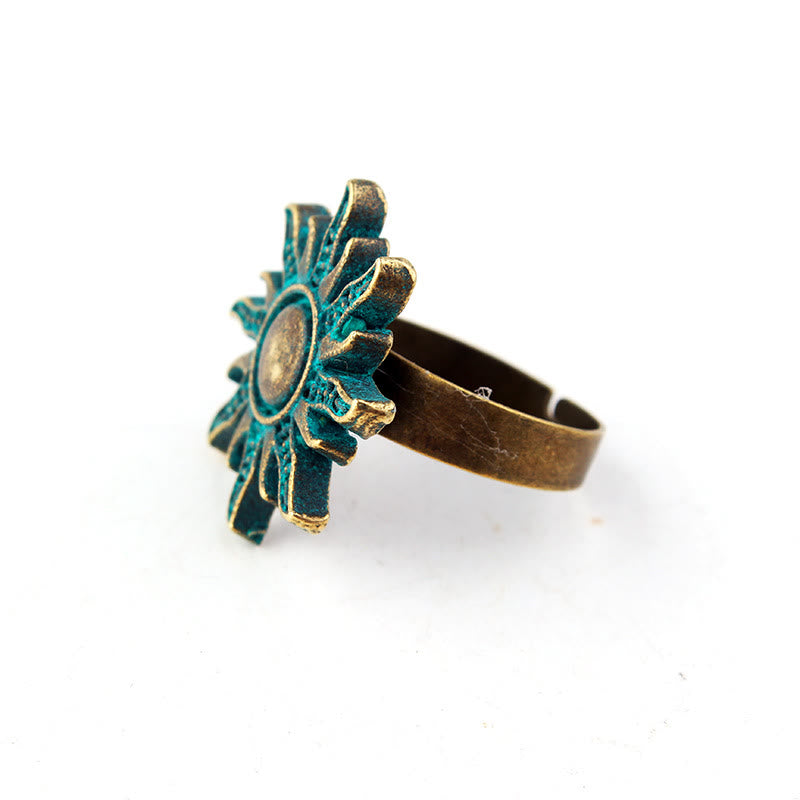 Anillo de bronce exótico gótico con sol verde oscuro de Olivenorma 