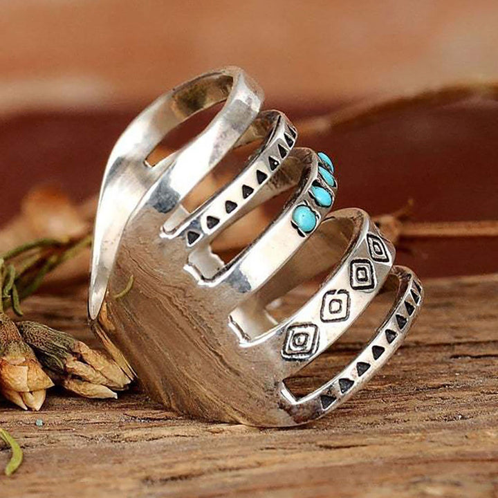 Anillo de plata de ley con turquesa tallada y diseño calado bohemio de Olivenorma