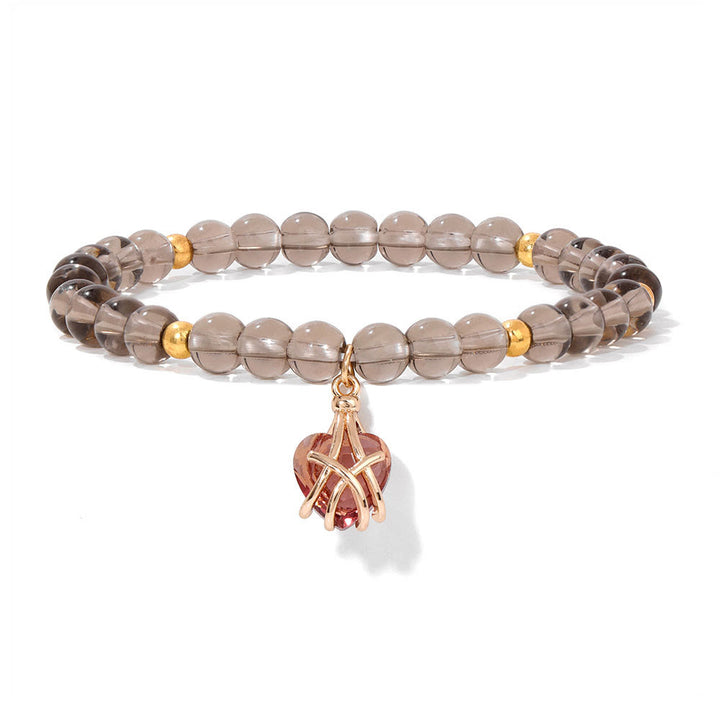 Pulsera con dije de corazón de piedra natural de Olivenorma