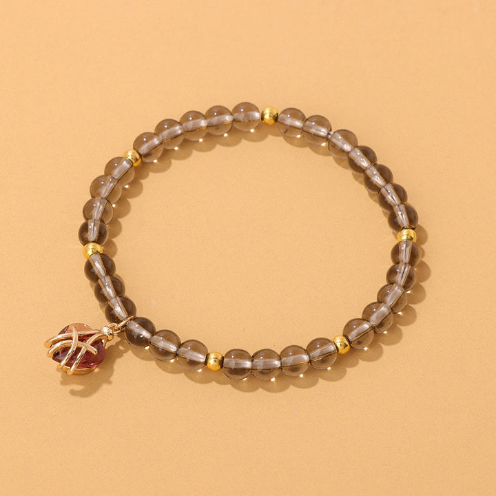 Pulsera con dije de corazón de piedra natural de Olivenorma
