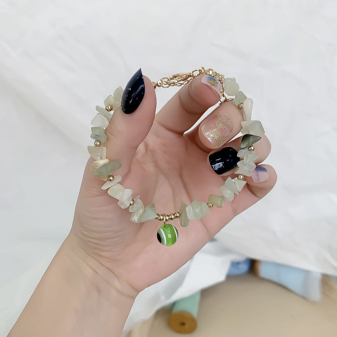 Pulsera con colgante de ojo malvado de grava de cristal natural de Olivenorma