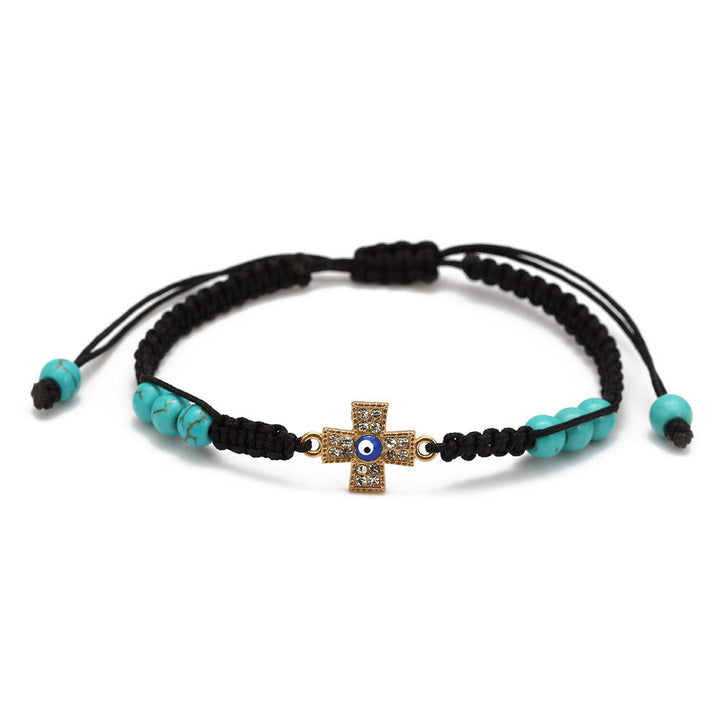 Pulsera trenzada ajustable con ojo malvado y circonita blanca y turquesa de Olivenorma 