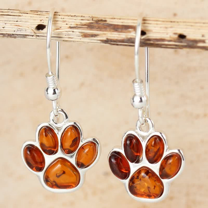Pendientes colgantes de ámbar con huella de pata de perro