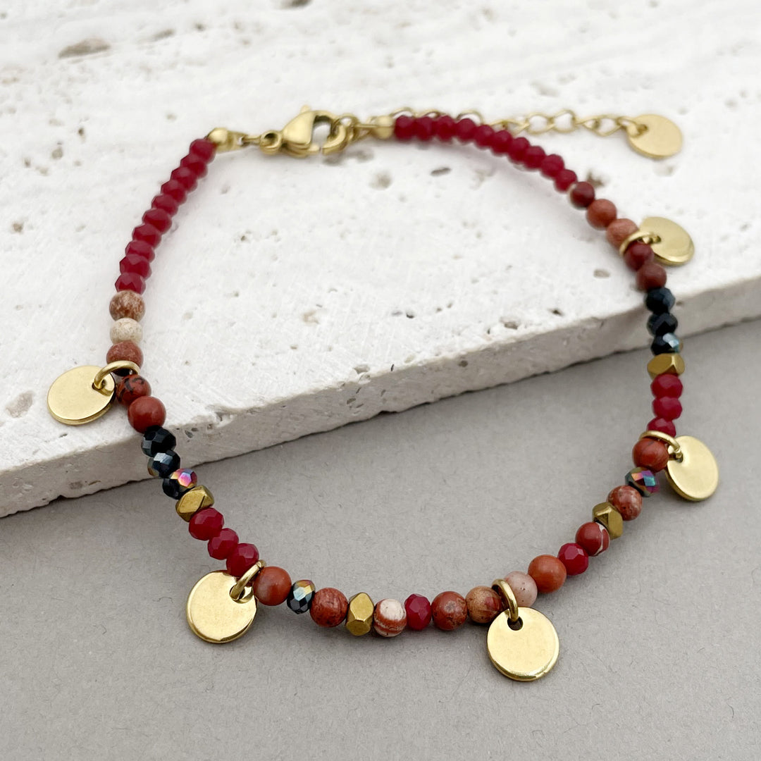 Pulsera con dijes de disco de titanio y cuentas de piedra natural de Olivenorma