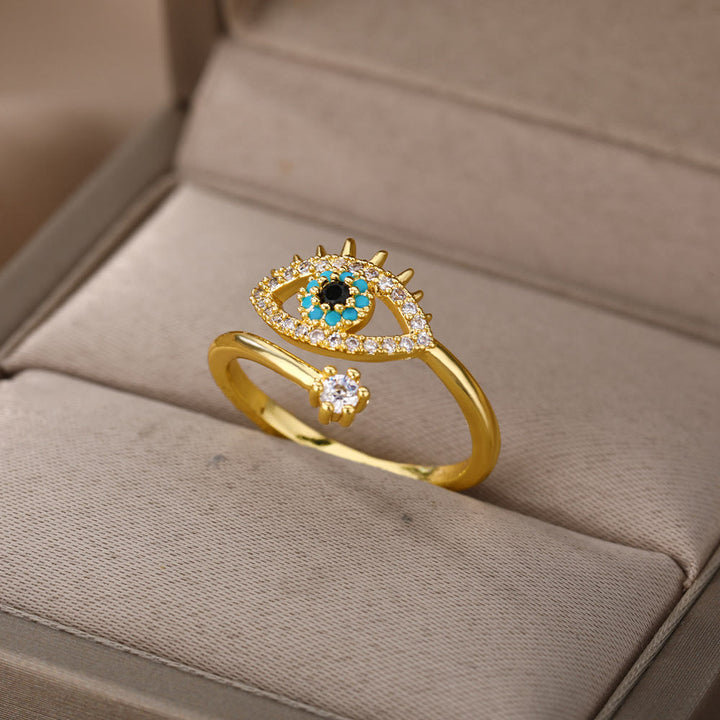Anillo ajustable con diamantes y ojo malvado de Olivenorma