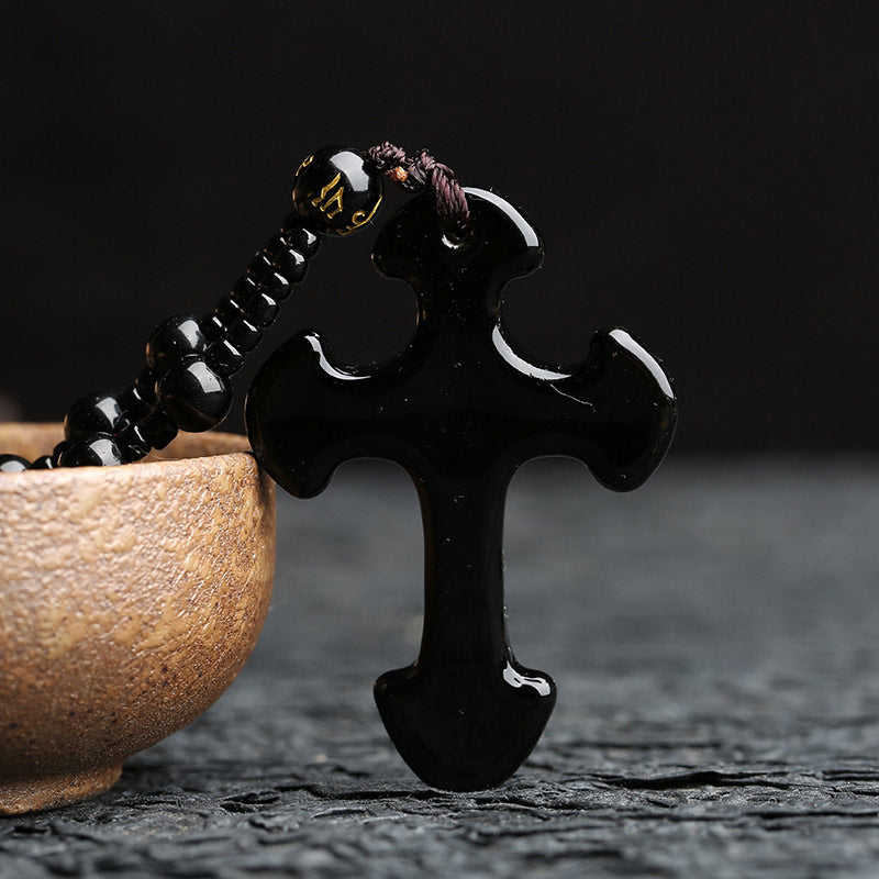 Collar con símbolo de cruz de obsidiana de Olivenorma 
