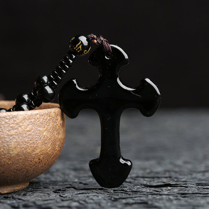 Collar con símbolo de cruz de obsidiana de Olivenorma 