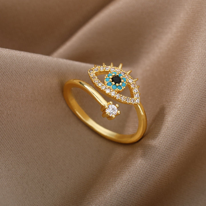 Anillo ajustable con diamantes y ojo malvado de Olivenorma