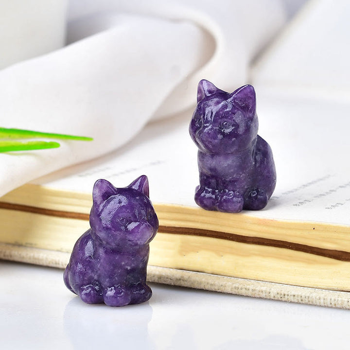 Artesanías con talladas de piedras preciosas y gatitos de cristal de Olivenorma.