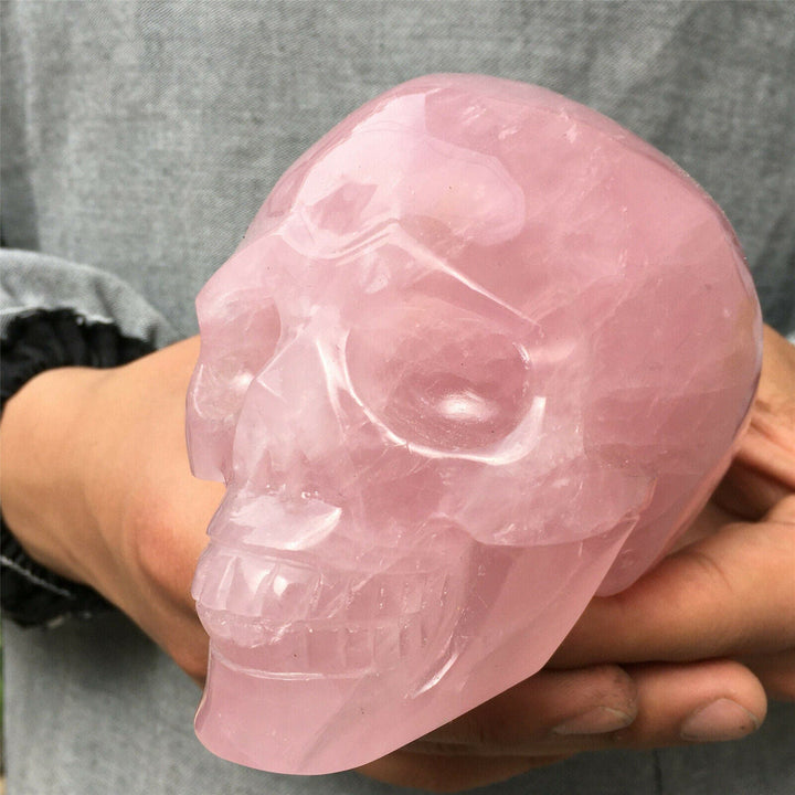 Decoración de calavera de cristal de cuarzo rosa natural de Olivenorma