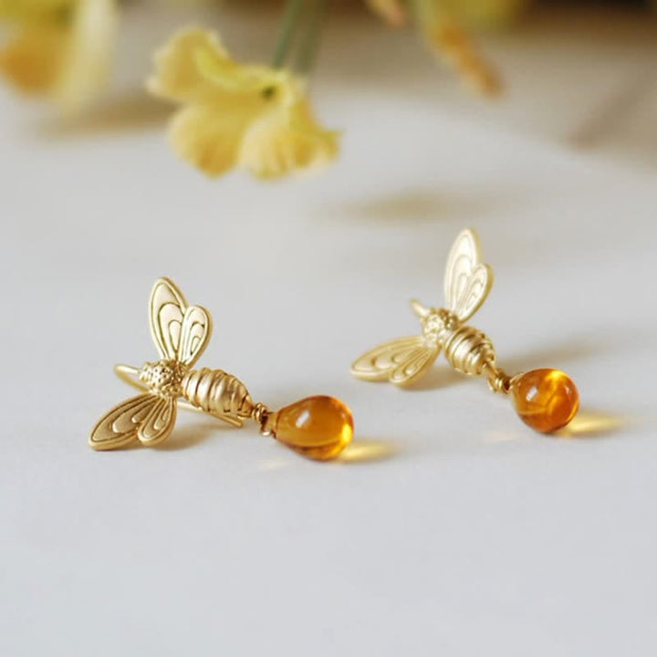 Pendientes y collar con gotas de miel de topacio y ámbar de Olivenorma