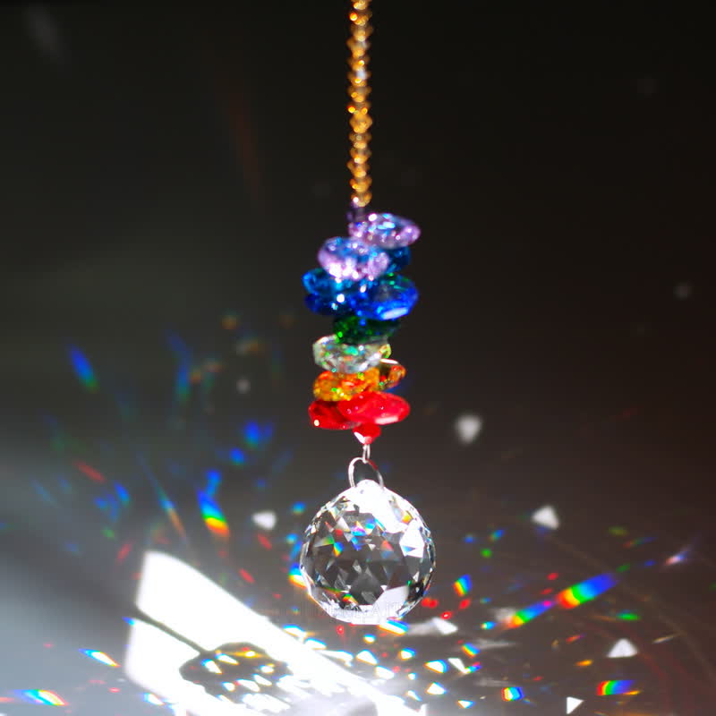 Adorno de piedra preciosa con forma de planeta meteorito y atrapasoles de cristal.