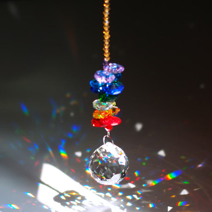 Adorno de piedra preciosa con forma de planeta meteorito y atrapasoles de cristal.
