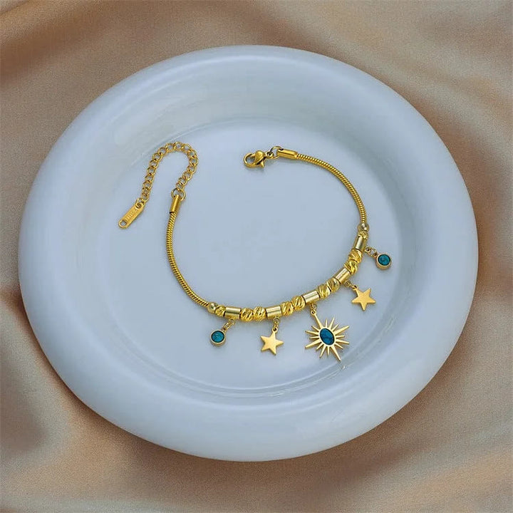 Pulsera envolvente con ojo malvado de turquesa dorada de Olivenorma