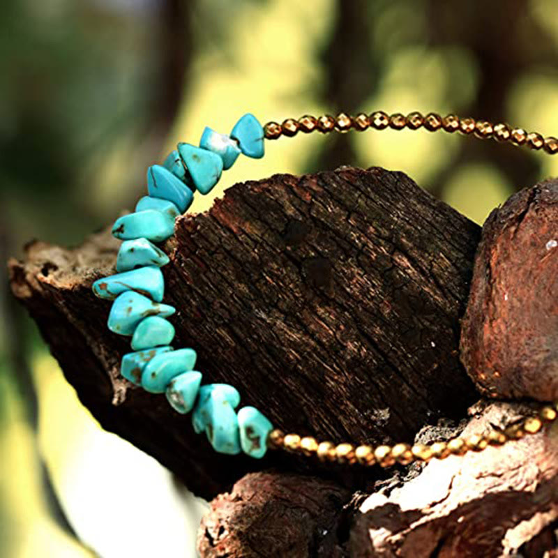 Pulsera de cuentas turquesas con cadena dorada de Olivenorma 