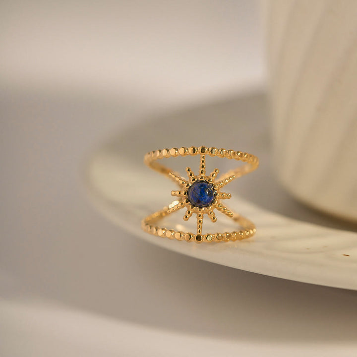 Anillo de gemas con estrella de ocho puntas y doble hilera de girasol de Olivenorma