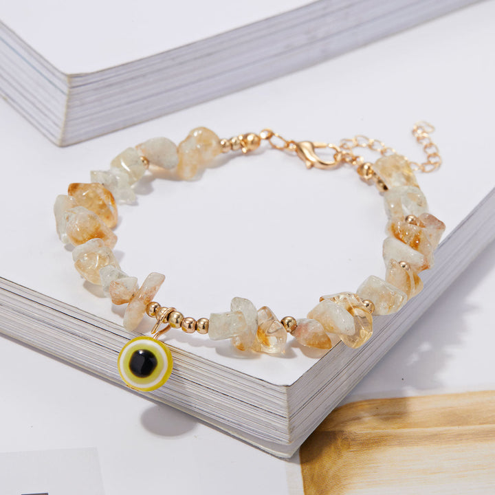 Pulsera con colgante de ojo malvado de grava de cristal natural de Olivenorma