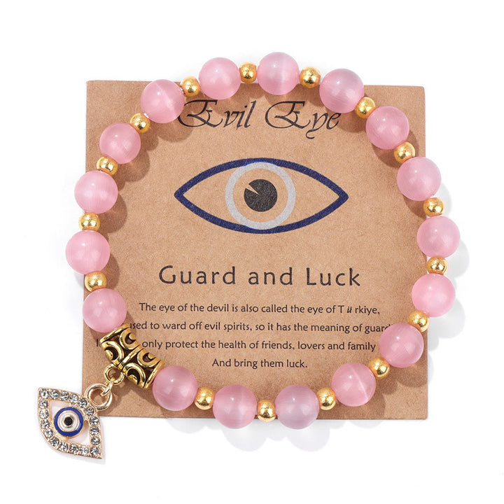 Pulsera con colgante de ojo malvado y cuentas de piedra natural de Olivenorma