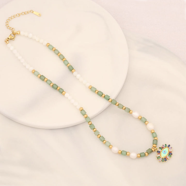 Collar con colgante de ojo malvado con piedra de cristal y perla natural de Olivenorma