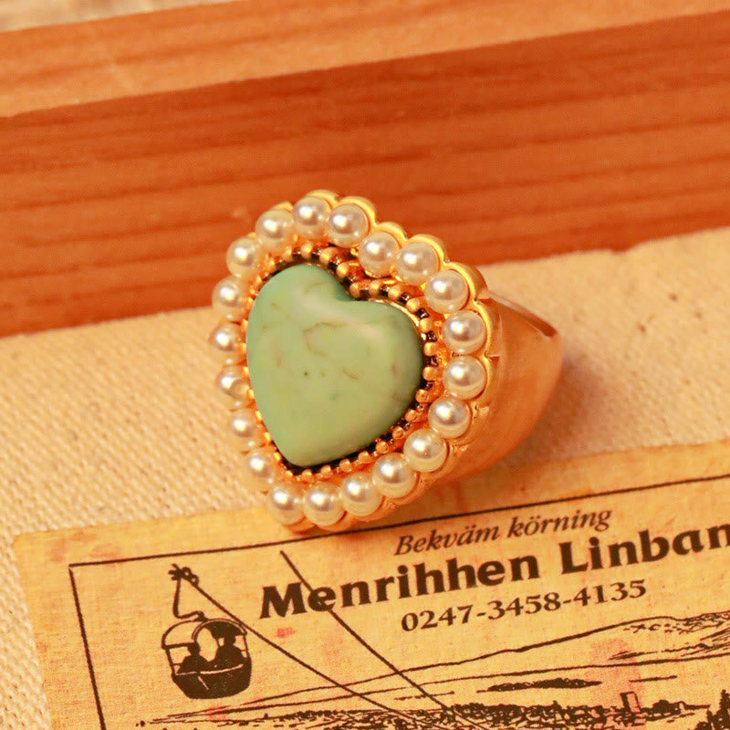 Anillo ajustable en forma de corazón con perla turquesa de Olivenorma 