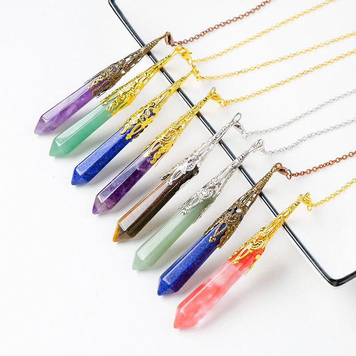 Péndulo de cadena de cobre y plata dorada con cristal natural de Olivenorma 