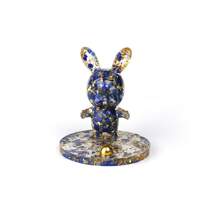 Soporte para teléfono móvil con forma de conejo de epoxi y grava de cristal natural de Olivenorma