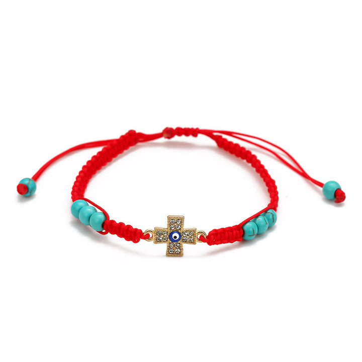 Pulsera trenzada ajustable con ojo malvado y circonita blanca y turquesa de Olivenorma 