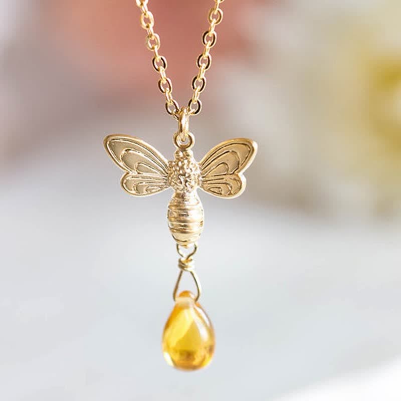 Pendientes y collar con gotas de miel de topacio y ámbar de Olivenorma