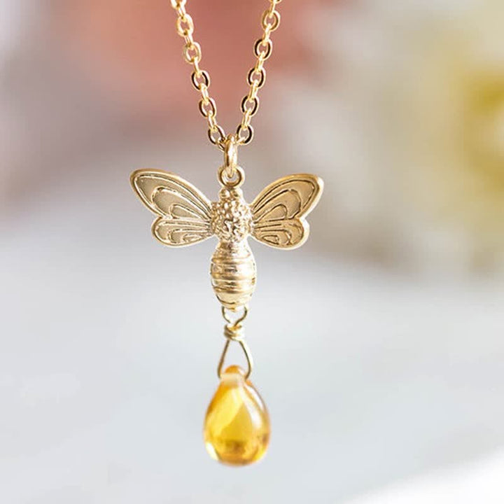 Pendientes y collar con gotas de miel de topacio y ámbar de Olivenorma
