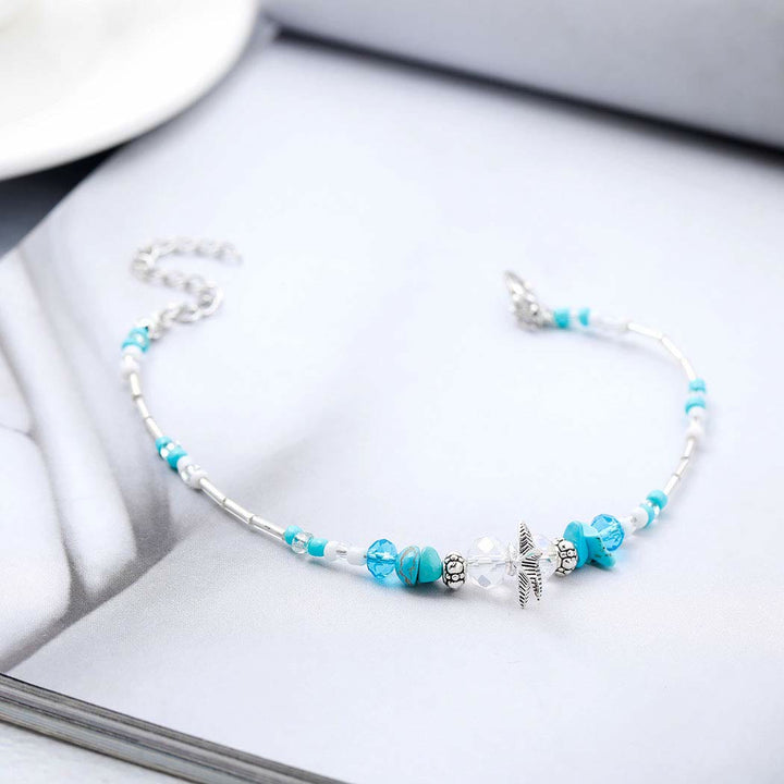 Pulsera tobillera con dije de estrella de mar turquesa y olas de Olivenorma