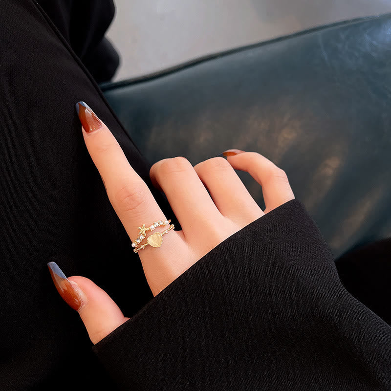 Anillo ajustable con piedra de ojo de gato y circonita blanca de Olivenorma 