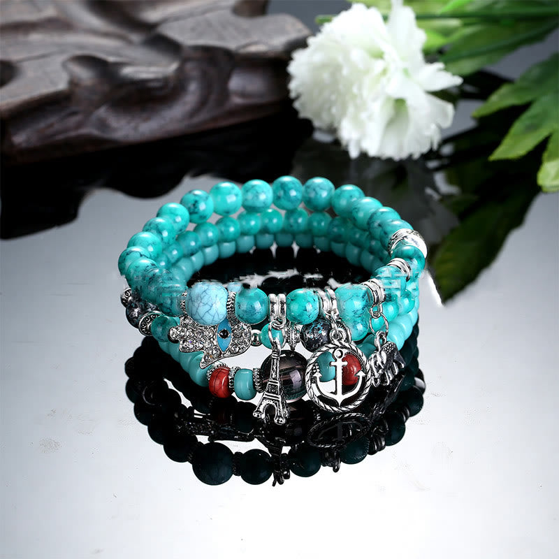 Juego de pulseras de hamsa con ojo malvado y torre de elefante de Olivenorma