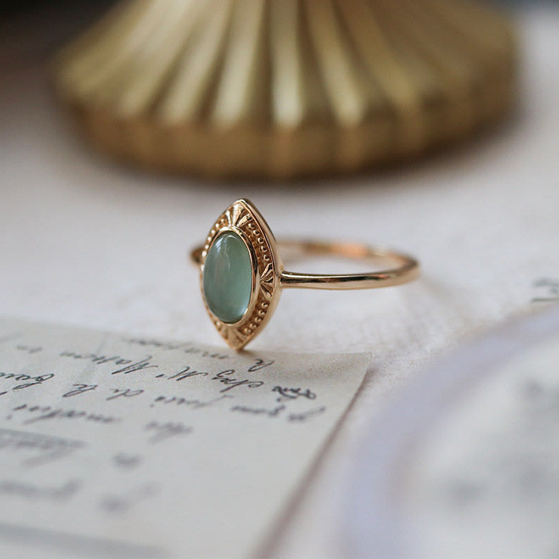 Anillo ajustable con encaje ovalado y peridoto natural de Olivenorma