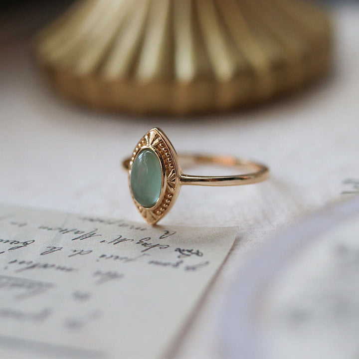 Anillo ajustable con encaje ovalado y peridoto natural de Olivenorma