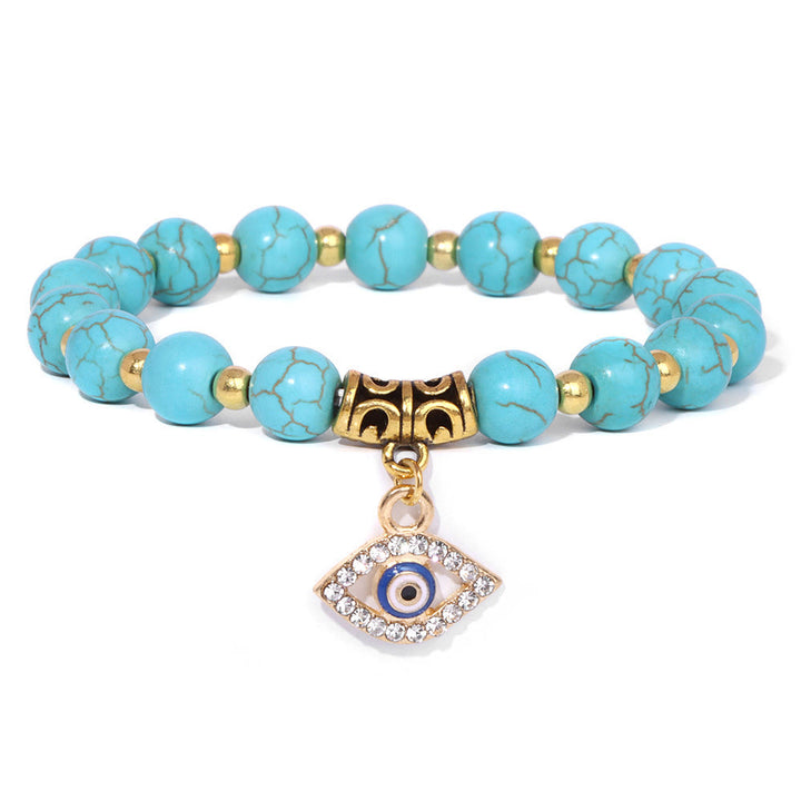 Pulsera con colgante de ojo malvado y cuentas de piedra natural de Olivenorma