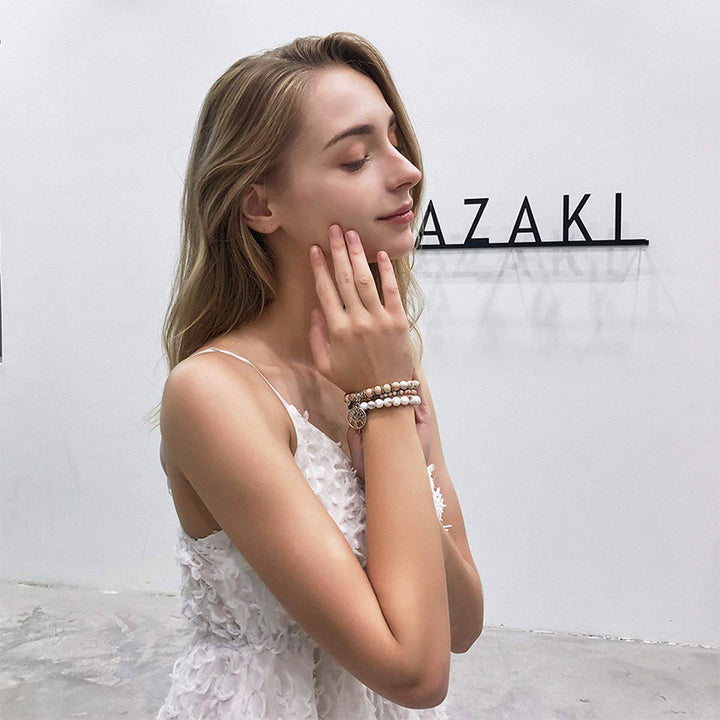 Pulsera de cuarzo rosa con el árbol de la vida de Olivenorma
