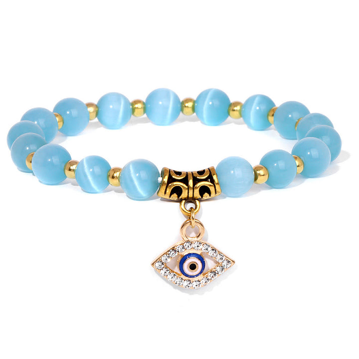 Pulsera con colgante de ojo malvado y cuentas de piedra natural de Olivenorma