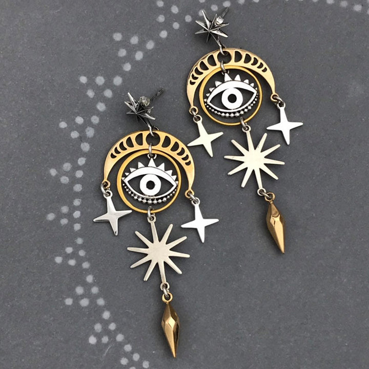 Pendientes de bruja con luna, estrella y ojo malvado de Olivenorma