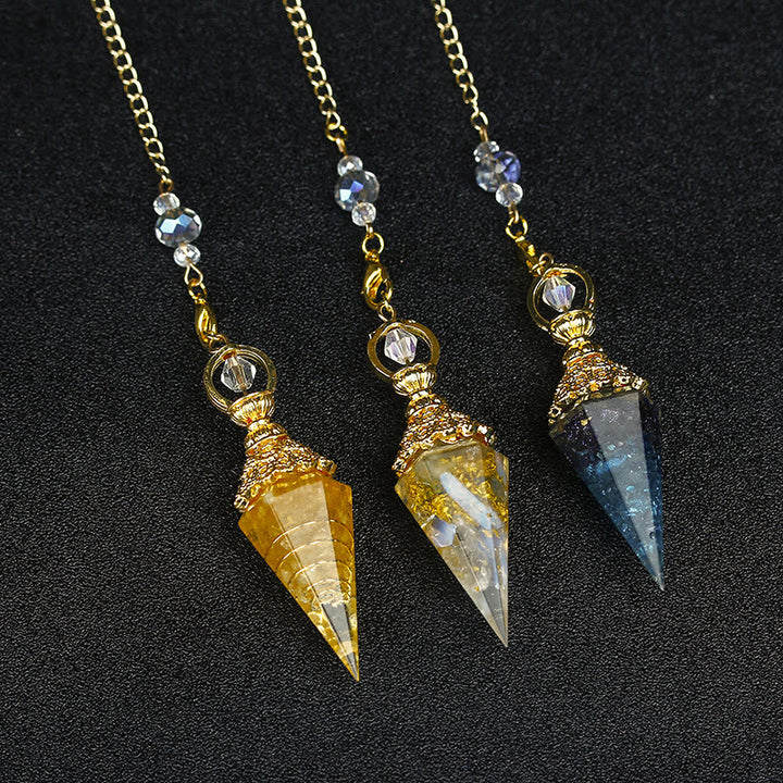 Péndulo piramidal hexagonal de resina de cristal natural de Olivenorma 