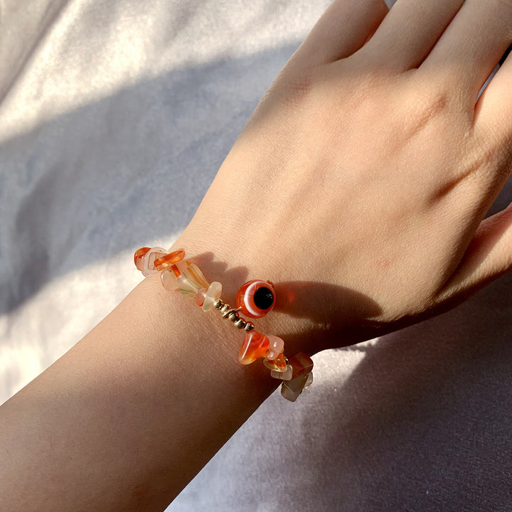 Pulsera con colgante de ojo malvado de grava de cristal natural de Olivenorma