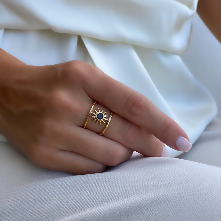 Anillo de gemas con estrella de ocho puntas y doble hilera de girasol de Olivenorma