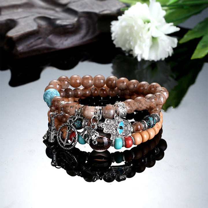 Juego de pulseras de hamsa con ojo malvado y torre de elefante de Olivenorma