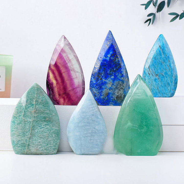 Adornos de piedras preciosas con forma de llama de cristal natural de Olivenorma