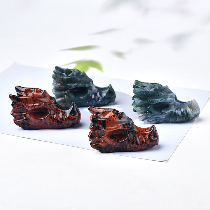 Piedra preciosa decorativa con forma de cabeza de dragón de ágata musgosa, obsidiana y caoba de Olivenorma. 