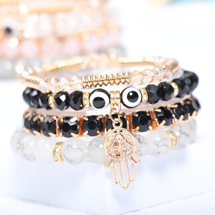 Juego de pulseras de cuentas de cuatro capas con ojo turco y hamsa de Olivenorma 