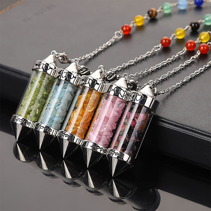 Péndulo de meditación de cristal de colores para los chakras