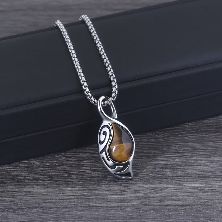 Collar de acero y titanio con ojo de tigre, protección, suerte y coraje de Olivenorma
