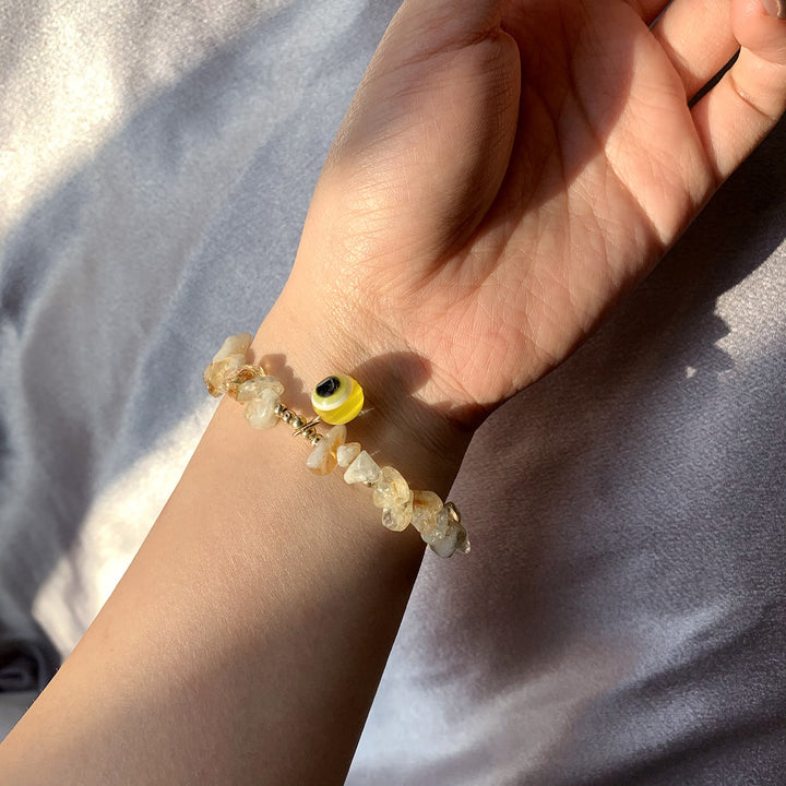 Pulsera con colgante de ojo malvado de grava de cristal natural de Olivenorma